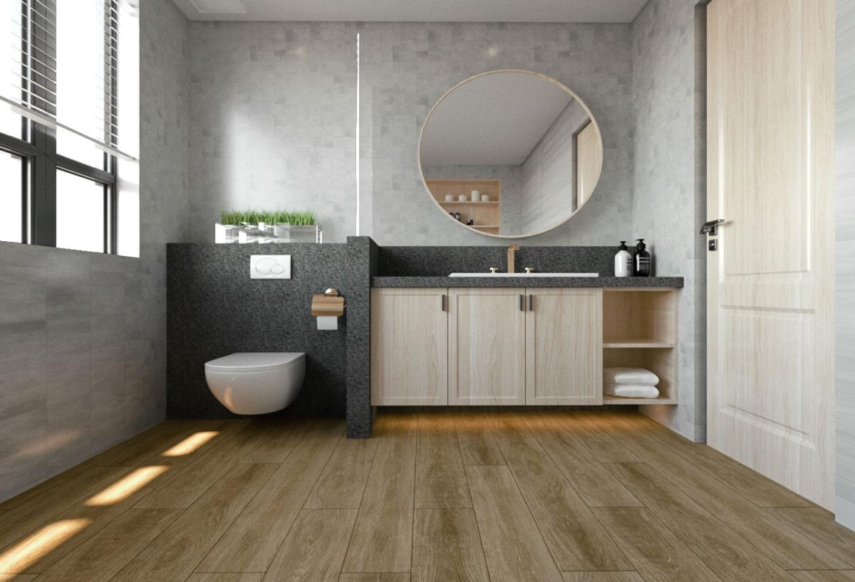 浴廁使用晶石防水地板鋪設，左邊放置馬桶，右邊設置洗手台，整體事舒適有理的空間。